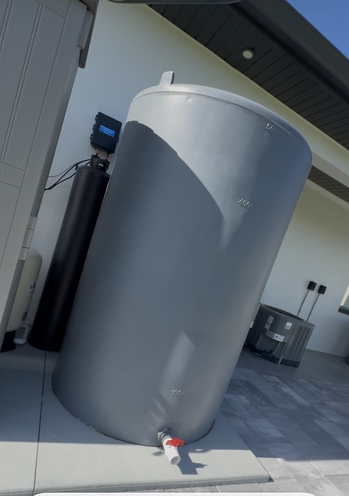Whole-house reverse osmosis atmospheric storage tank installed by Trinity